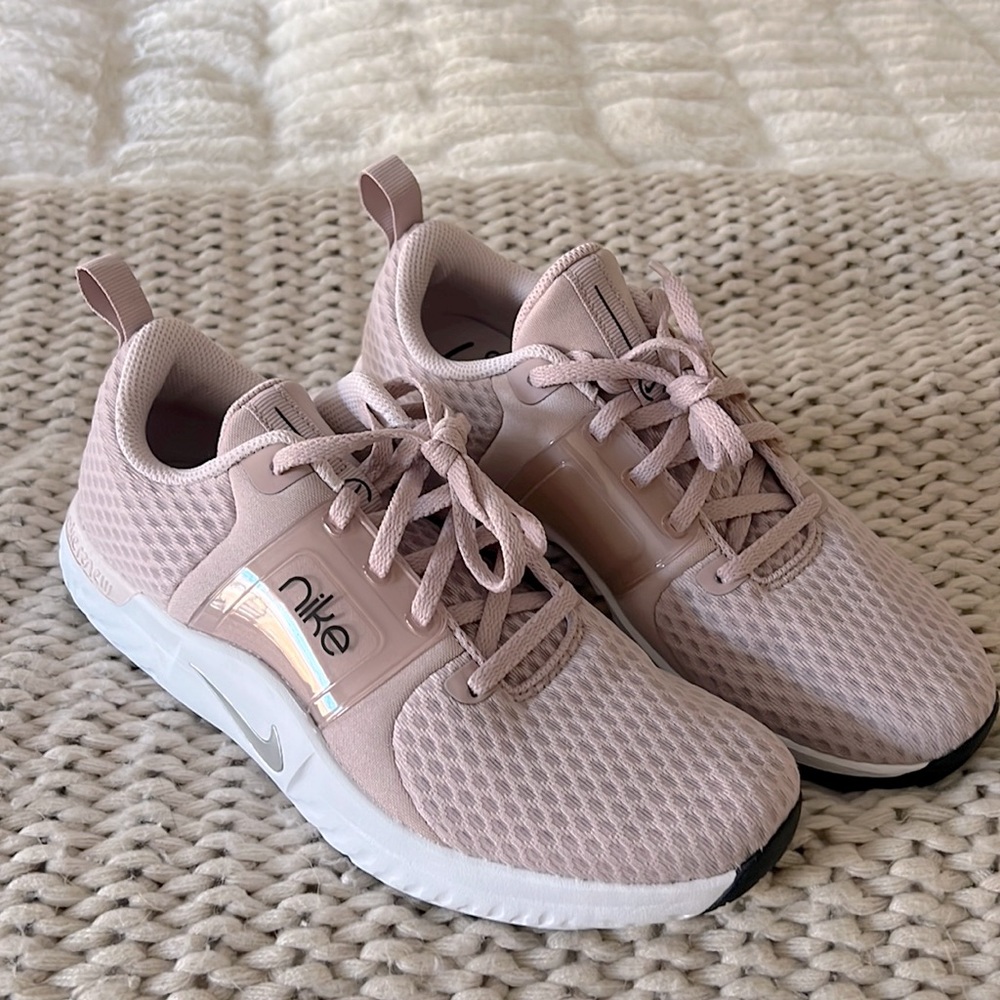 Dusty pink nike sneakers size 8.5 worn once.